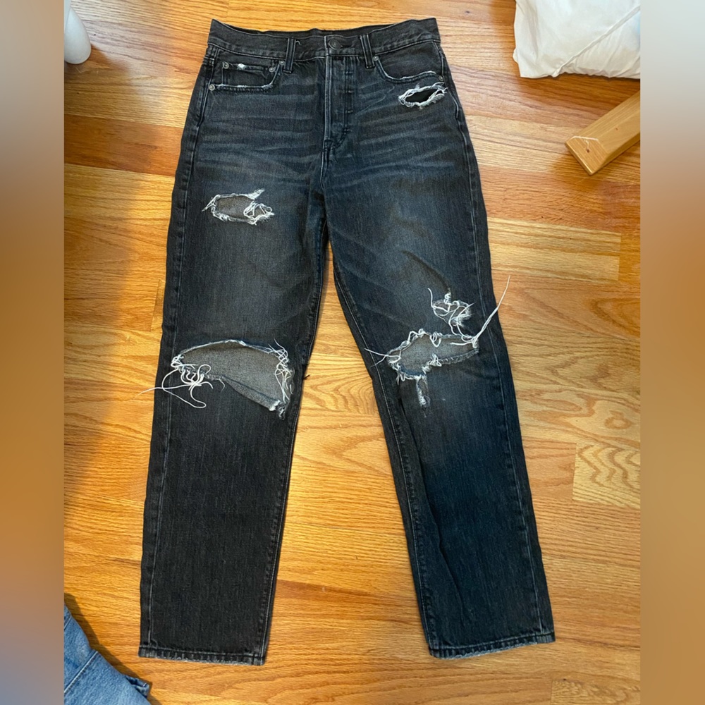 Baggy black ripped jeans
